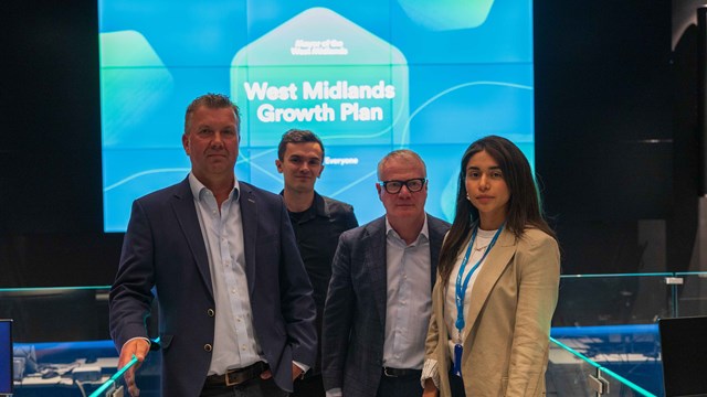 Mayor Richard Parker (second right) and Dan Cartter, SCC's director of innovation (left) with Rose Palacios and Callum Woodford, who are AI and innovation consultants at the global headquarters of IT service provider SCC.